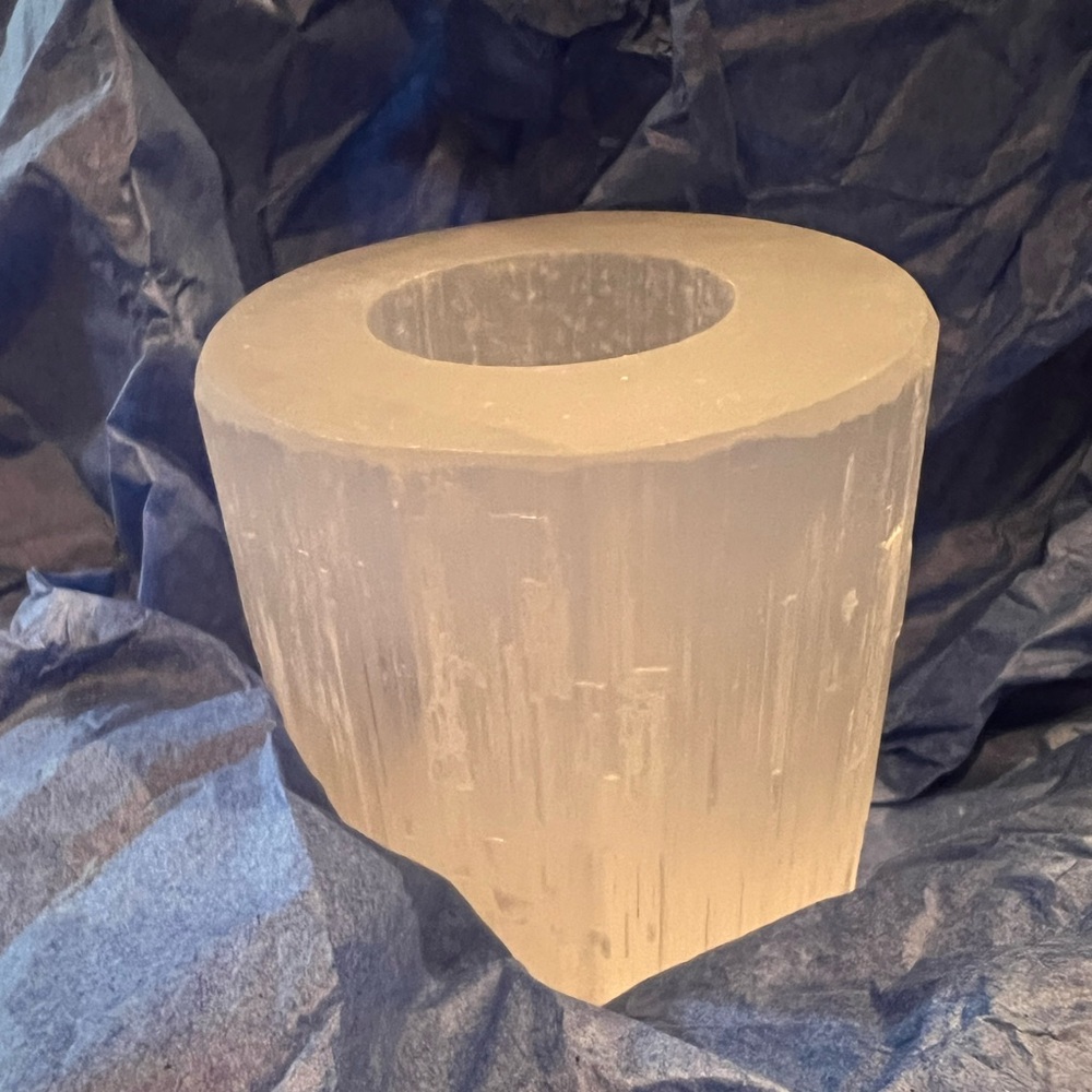 Selenite Tea light candle holder.  Natural carved stone piece.